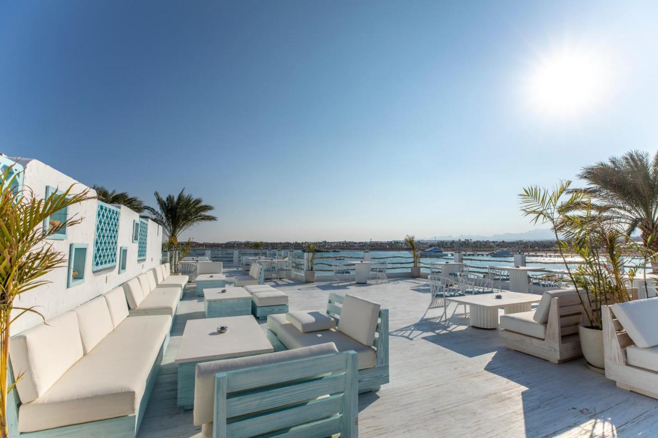 Sunrise Tucana Resort Grand Select Hurghada Eksteriør billede The rooftop bar at the hotel