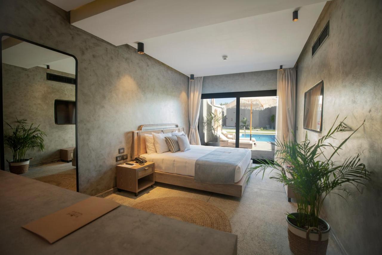 Sunrise Tucana Resort Grand Select Hurghada Eksteriør billede A bedroom at the hotel